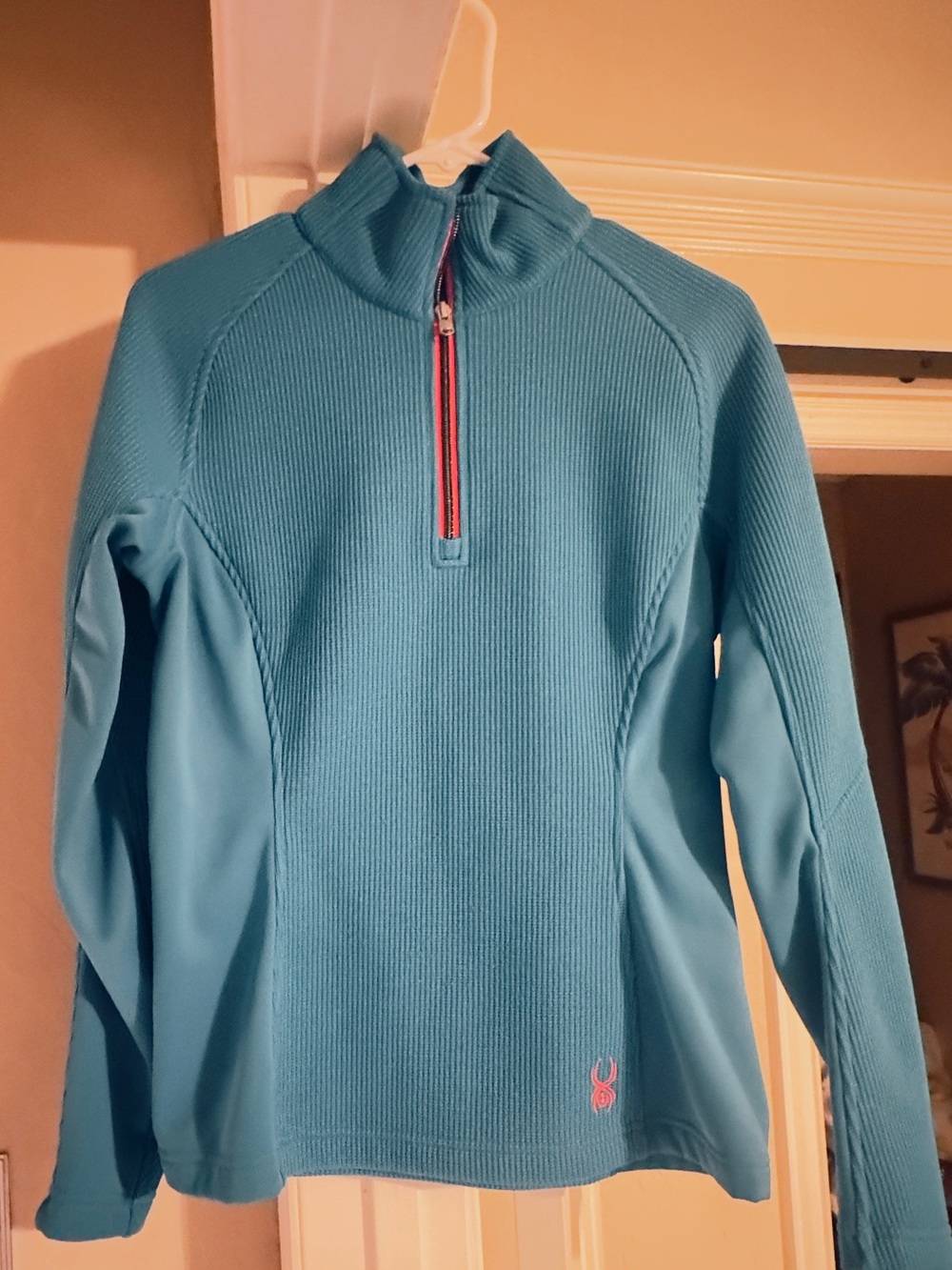 Woman’s Light Blue Quarter-Zip Performance cold weather Sweater